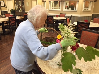 Mom arranging bouquet The Arbors June 2017